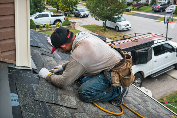 Professional Roofing technician working in Franklin Springs, NY